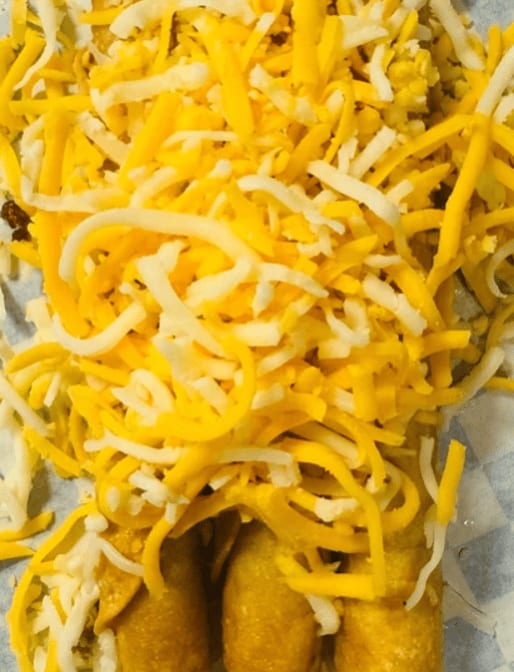 3 Rolled Tacos with Cheese.